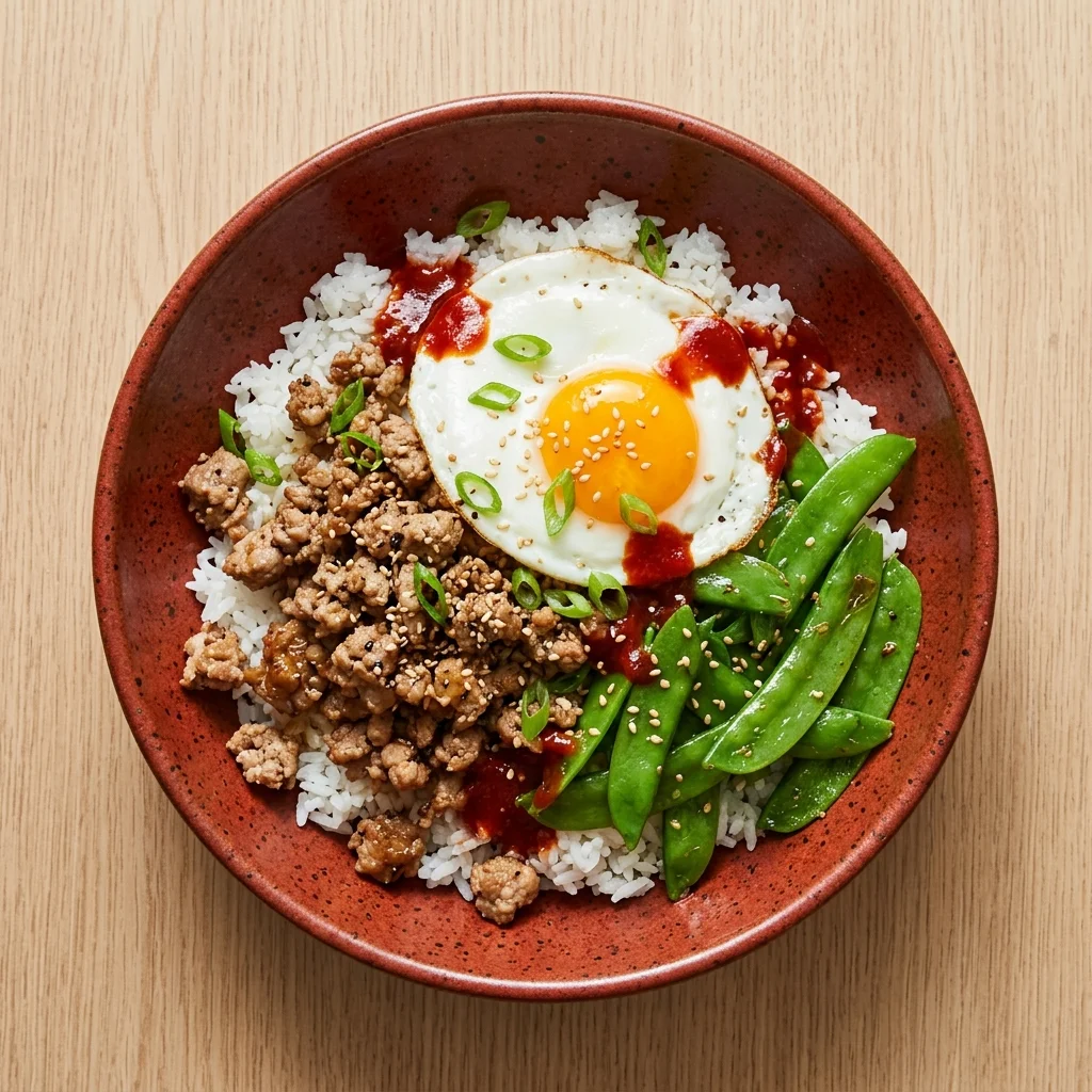 Black Pepper Pork Bibimbap with Snow Peas