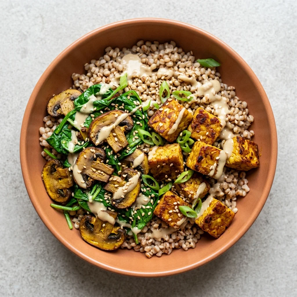 Turmeric-Ginger Tempeh & Sorghum Bowl with Mushrooms